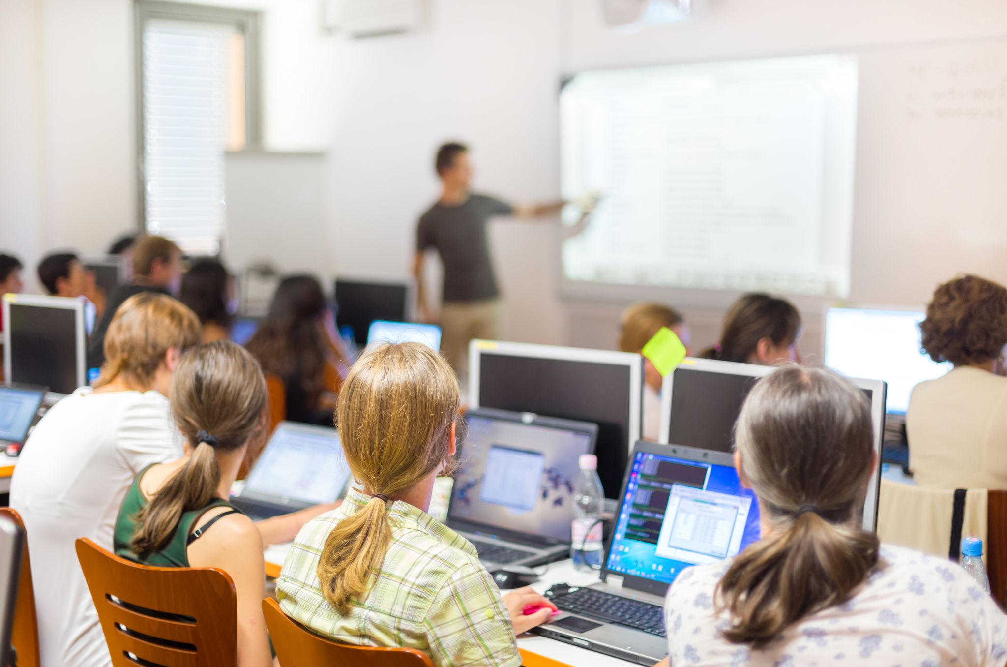 School brand resource guide with logo usage guidelines and colour specifications